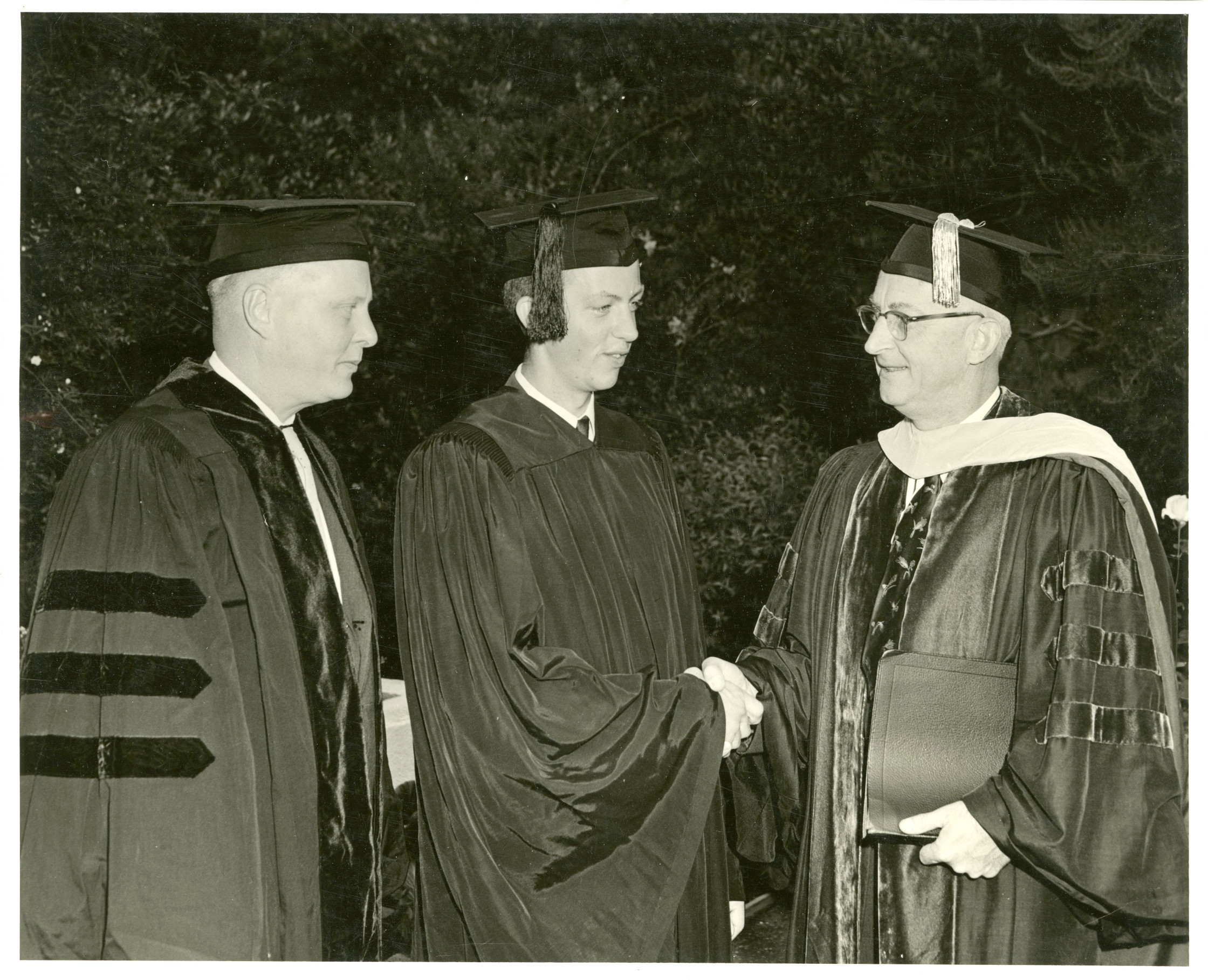 Left to right, U. Alexis Johnson '31, Robert Hepler, top senior, and Oxy President Arthur G. Coons on June 16, 1957